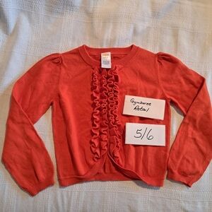 Gymboree girls size small or 5/6 orange button up sweater with ruffles